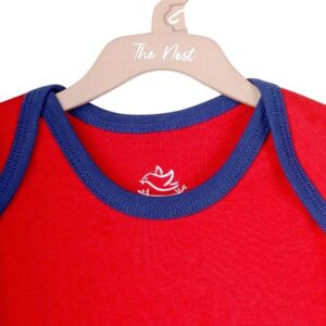 • Brand: The Nest • Introducing our adorable and comfy solid red bodysuit with stylish blue trim • Made from 100% super soft cotton, this bodysuit is gentle on your baby’s delicate skin and perfect for all-day wear • The snap closures make it easy to change your little one, while the sleeveless design gives them the freedom to move, crawl, and climb with ease • Whether your baby is playing, napping, or exploring, this bodysuit is a versatile and stylish addition to their wardrobe • Plus, the vibrant red color is sure to bring a pop of fun and energy to any outfit • Perfect for summer days, this bodysuit will keep your baby cool and comfortable while looking absolutely adorable